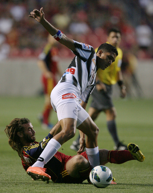 Steve Griffin | The Salt Lake Tribune


Real Salt Lake's Kyle Beckerman slides as he kicks the ball away from Tauro FC's Edwon Aguilar during a Champions League game at Rio Tinto Stadium in Sandy on Tuesday, Aug. 21, 2012.