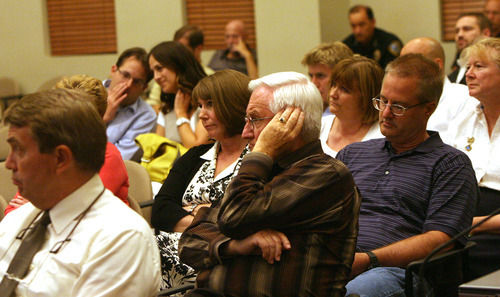 Leah Hogsten  |  The Salt Lake Tribune
Residents for and against  Andrew Kelley's request to amend his Corner Canyon subdivision plan by removing a development restriction give their opinions at Draper City Hall council chambers August 21, 2012. The Andrew Kelley family wants to lift a development restriction on open space in their backyard near Corner Canyon in Draper, but neighbors worry about the aesthetics and say the rule should not be changed.