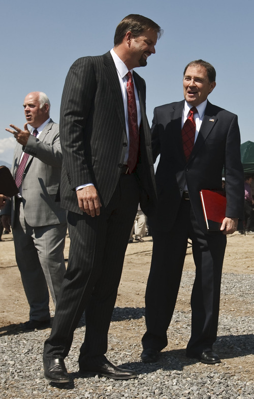 Leah Hogsten  |  The Salt Lake Tribune
Jim Loveland, President and Ceo of Xactware Solutions and Utah Governor Gary Herbert share a laugh during the groundbreaking for the new offices of Xactware Corporation August 23, 2012 on West Morning Glory Road in Lehi. Xactware's software is used by contractors, insurance companies and others to estimate building repair costs. The company plans to invest $130 million in a new 250,000-square-foot campus $32 million the company received in tax incentives from the state. The company plans to hire more than 800 people over the next two decades.