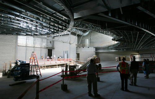 Steve Griffin | The Salt Lake Tribune
Salt Lake County and West Valley City officials get a tour of the new Granger High School construction site Wednesday, Aug. 22, 2012. Here, guests get a view of the 1,500-seat auditorium. Last year, students and community members celebrated the completion of Granger's football stadium, complete with bright red seats and a field adorned with a giant 