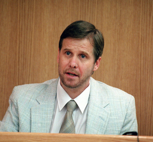Tribune file photo
John Pinder testifies during his 2000 murder trial.