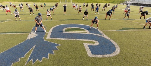 Trent Nelson  |  The Salt Lake Tribune
Juan Diego High School football coach John Colosimo runs practice in Draper on Thursday, Aug. 16, 2012. The team has been deeply shaken by the death of player Adam Colosimo.