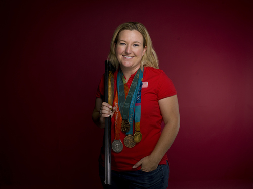 Shooting athlete Kim Rhode poses for a portrait at the 2012 Team USA Media Summit on Monday, May 14, 2012 in Dallas. She will be among the Olympians appearing at the 2012 GOP Convention. (AP Photo/Victoria Will)