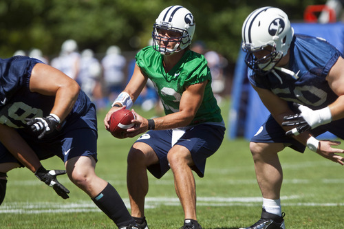 Chris Detrick  |  The Salt Lake Tribune
BYU's Riley Nelson during a preseason practice at the BYU outdoor practice field Thursday August 2, 2012.