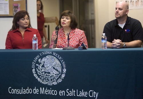 AL HARTMANN  |  The Salt Lake Tribune
Elena Bensor, a spokeswoman for the Utah Labor Commission, left; Socorro Rovirosa, Mexican Consul in Salt Lake City, and Kevin Hunt, of the U.S. Department of Labor, speak Monday at a ceremony to kick off Labor Rights Week.