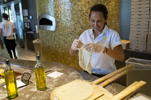 Chris Detrick  |  The Salt Lake Tribune
Mirna Hekking makes a Salsiccia pizza at Pizzeria Limone on Aug. 24, 2012.