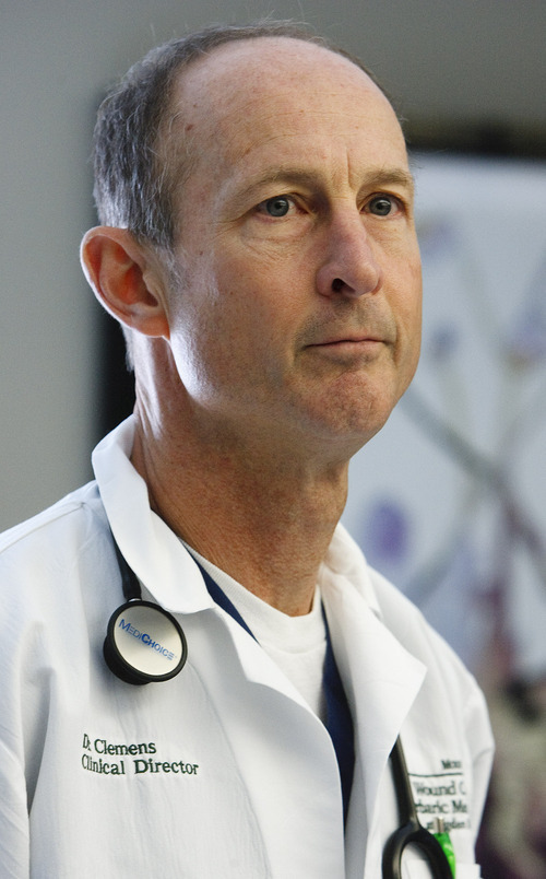 Leah Hogsten  |  The Salt Lake Tribune
Physician Peter Clemens, clinical director of Ogden Regional Medical Center's Wound Care and Hyperbaric Center, treated Ogden resident and Mount Everest climber William Calton. This past spring, Calton barely survived a deadly traffic jam on Mount Everest.