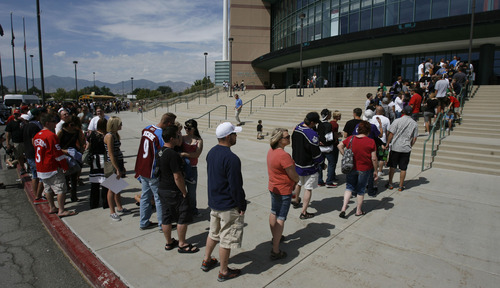 Francisco Kjolseth  |  The Salt Lake Tribune
Thousands of fans lined up at the Maverik Center in West Valley City on Thursday, August 30, 2012, for a chance to pose for a picture with Trevor Lewis and the Stanley Cup. Lewis, who played hockey for Brighton High School, brought the home for a day as a member of the NHL champion Los Angeles Kings.