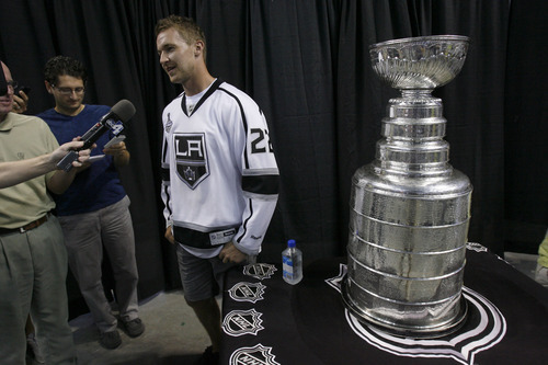 Francisco Kjolseth  |  The Salt Lake Tribune
Trevor Lewis, who played hockey for Brighton High School, speaks with the media as he brings the Stanley Cup home for a day as a member of the NHL champion Los Angeles Kings. Thousands of fans lined up at the Maverik Center in West Valley City on Thursday, August 30, 2012, for a chance to pose for a picture with Lewis and the Cup.