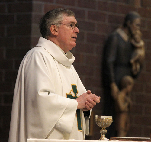 Al Hartmann  |  The Salt Lake Tribune
Monsignor Francis Mannion is retiring. Here, he conducts Mass at St. Vincent de Paul Catholic Church on Wednesday, Aug. 22.