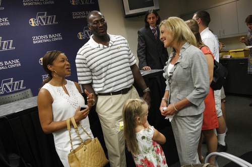 Francisco Kjolseth  |  The Salt Lake Tribune
Utah Jazz coach Tyrone Corbin and his wife Dante, left, welcome Rebecca Lindsey with her daugher Jessica, 6, to Utah following the announcement that Rebecca's husband Dennis Lindsey was the new general manager of the Jazz on Tuesday, August 7, 2012.