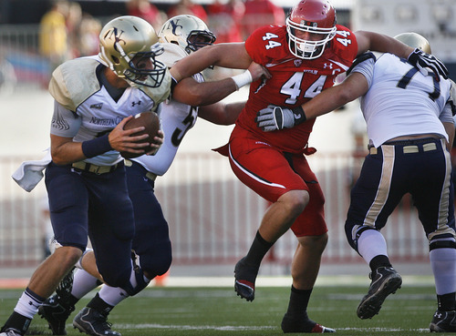 Scott Sommerdorf  |  The Salt Lake Tribune             
Utah DT Dave Kruger tries to get past the No. Colo. offensive line during first quarter play. Utah held a 7-0 lead over Northern Colorado early in the second quarter on Jordan Wynn's 10 yard TD pass to Jake Murphy, Thursday, August 30, 2012.