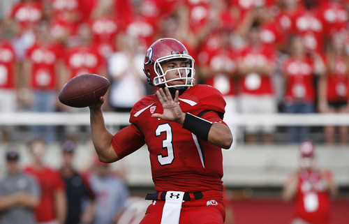 Scott Sommerdorf  |  The Salt Lake Tribune             
Utah QB Jordan Wynn throws a 10 yard TD pass to Jake Murphy that gave Utah a 7-0 lead over Northern Colorado early in the second quarter on Thursday, August 30, 2012.