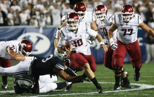 Kim Raff | The Salt Lake Tribune
Brigham Young Cougars linebacker Kyle Van Noy (3) misses a tackle on Washington State Cougars quarterback Jeff Tuel (10) during BYU's home opener at LaVell Edwards Stadium in Provo on Aug. 30, 2012.