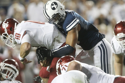 Chris Detrick  |  The Salt Lake Tribune
Brigham Young Cougars linebacker Kyle Van Noy (3) sacks Washington State Cougars quarterback Jeff Tuel (10) during the first half of the game against Washington State at LaVell Edwards Stadium Thursday August 30, 2012. BYU is winning the game 24-6.