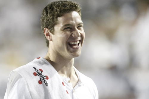 Chris Detrick  |  The Salt Lake Tribune
Former BYU basketball player Jimmer Fredette laughs during the second half of the game against Washington State at LaVell Edwards Stadium Thursday August 30, 2012. BYU won the game 30-6.