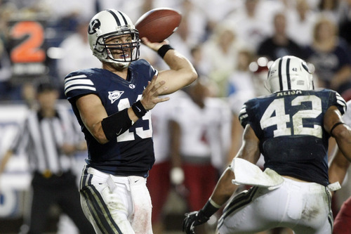 Chris Detrick  |  The Salt Lake Tribune
BYU quarterback Riley Nelson throws the ball during the second half of the game against Washington State at LaVell Edwards Stadium in Provo on Thursday, Aug. 30, 2012. BYU won the game 30-6.