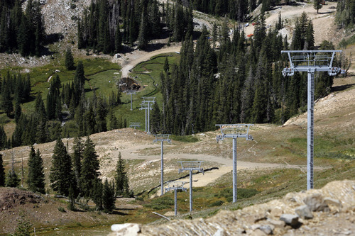 Rick Egan  | The Salt Lake Tribune 
The new Little Cloud high-speed quad at the top of Hidden Peak at Snowbird is under construction, Wednesday, Aug. 29, 2012. Snowbird is transforming the Little Cloud lift into a high-speed quad for the winter ski season.