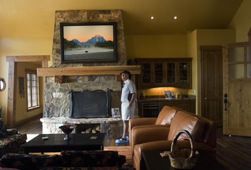 Kim Raff |  The Salt Lake Tribune
Bob Hindy walks through the den of the 4,500-square-foot home on Dakota Trail in the Promontory in Park City Utah during the Park City Showcase of Homes on September 2, 2012.