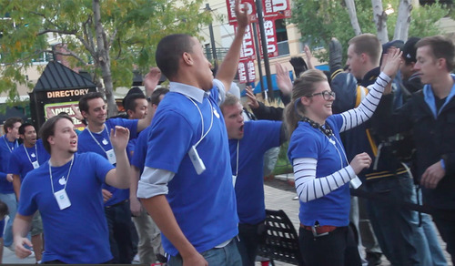 Rick Egan  | The Salt Lake Tribune 

Apple Store employees high-five those that have been in line overnight, at the Apple store in the Gateway Center, for the new Apple iPhone 4S, Friday, October 14, 2011. There is even more anticipation building for the new iPhone 5, which is expected to be announced Sept. 12. But there may be reasons to hold off on buying the new phone.
