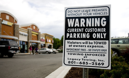 Kim Raff |  The Salt Lake Tribune
A sign in the parking lot of 33rd St. Station stating the parking policy.