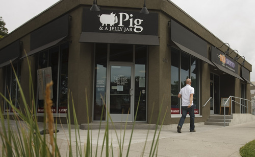 Leah Hogsten  |  The Salt Lake Tribune


A classic American diner, Pig and a Jelly Jar, comes to the streets of Liberty Park. The 21st-century twists include a clean contemporary space with a menu trying to push burgers and fries and breakfast a little bit further.