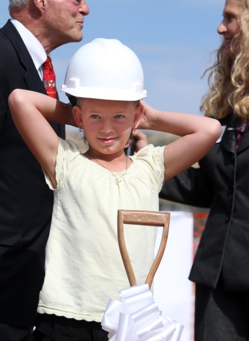Rick Egan  |  The Salt Lake Tribune 
Aumberlee Davis, a 10-year-old undergoing treatment for leukemia, prepares to take the first scoop of dirt at the groundbreaking ceremony for the new George S. and Dolores Doré Eccles Outpatient Services Building on Thursday.