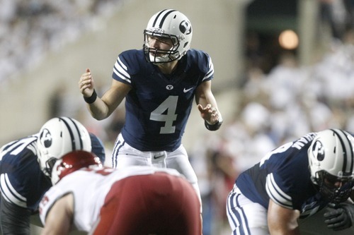 Chris Detrick  |  The Salt Lake Tribune
Brigham Young Cougars quarterback Taysom Hill (4) during the first half of the game against Washington State at LaVell Edwards Stadium Thursday August 30, 2012. BYU is winning the game 24-6.