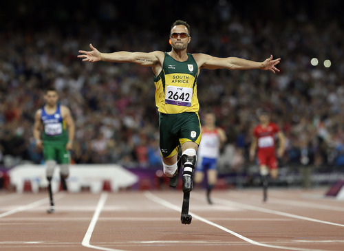 South Africa's Oscar Pistorius wins gold in the men's 400-meter T44 final at the 2012 Paralympics, Saturday, Sept. 8, 2012, in London. (AP Photo/Kirsty Wigglesworth)