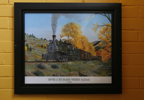 Scott Sommerdorf  |  The Salt Lake Tribune             
A painting in the Union Station Trainmen's Building shows an image of the narrow gauge locomotive and tender that a group of volunteers in Ogden are restoring.