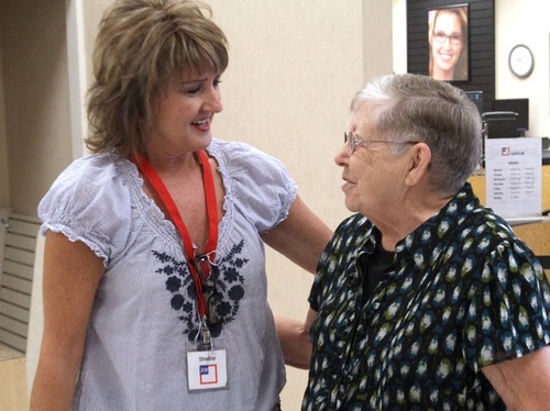 Rick Egan  | The Salt Lake Tribune 

Shellie Hoyt (left) congratulates Merle Hansen (right) for her 41 years of service, Thursday, August 16, 2012. Hansen has been a store clerk at the JCPenney store in the Valley Fair Mall for 41 years. She was honored by her work colleagues on Thursday morning, before the store opened to customers.