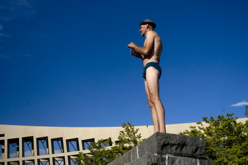 Kim Raff | The Salt Lake Tribune
James Lyons stands on top of the fountain at Library Square and takes pictures of the crowd gathered for the 5k Utah Undie Run in Salt Lake City, Utah on September 9, 2012. Thousands of people gathered in hopes of breaking last years record of 2,270 people which was the largest gathering of people wearing only underpants.