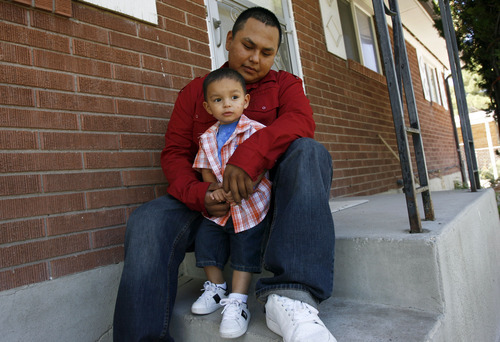 Francisco Kjolseth  |  The Salt Lake Tribune
Ernesto Perez, who turns 21 next month, spends time with his son Dominique, 2, at their home in Salt Lake. Ernesto is a success story of Stand a Little Taller (SALT) program, an anti-gang program in SLC that helps young men stay away from gang life and move towards being successful. Perez has been involved in sports programs and or structured SALT activities in the past that has helped him steer a better course in life.