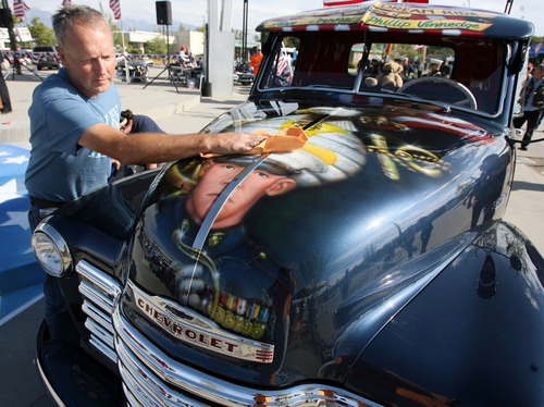 Steve Griffin | The Salt Lake Tribune


Dave Vinnedge, father of Lance Corporal Phillip David Vinnedge, who died while serving in Afghanistan, polishes the vintage truck he, and his wife, Julie Vinnedge, restored in honor of their son. They were at an event at Fairbourne Station Plaza, in West Valley City on Tuesday, Sept. 11, 2012. The Vinnedge's fulfilled his dream of restoring a 1951 Chevy truck complete with murals honoring him, his family, his military colleagues and those lost on September 11, 2001. Lance Cpl. Vinnedge's parents now travel and display the truck in memory of their son. They will be in Camp Pendleton Sept. 13, 2012 to show the truck to his son's platoon. Phillip was deployed with the 3rd Battalion, 5th Marine Regiment to Afghanistan and on October 13, 2010 Phillip was driving the lead vehicle on a security patrol with Lcpl Victor Dew, Lcpl Joe Rodewald and Cpl Justin Cain when a large IED was remotely detonated killing all 4 instantly.