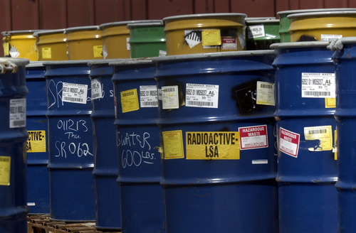 Tribune file photo
Barrels of radioactive waste waits to be stored at the  EnergySolutions site in Tooele County in this file photo.