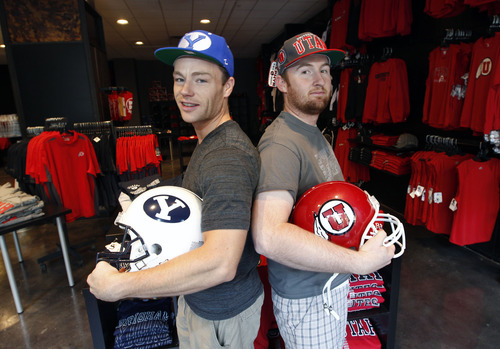 Al Hartmann  |  The Salt Lake Tribune
Trevor Grigg, left, and Joe Bunt, co-owners of new the U Rivals store in The Gateway, are counting on the BYU-Utah rivalry to help make their business a success. Both are graduates and fans of Boise State.