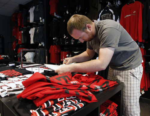 Al Hartmann  |  The Salt Lake Tribune
 Joe Bunt and his partners in the new U Rivals store at The Gateway offer a variety of collegiate merchandise, specializing in the University of Utah and Brigham Young University.