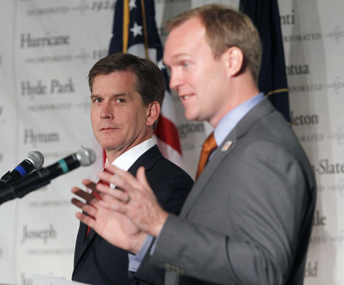 Al Hartmann  |  The Salt Lake Tribune
Candidates for Salt Lake County mayor,  Mark Crockett, left,  and Ben McAdams debate at the Utah League of Cities and Towns annual conference Friday September 14.