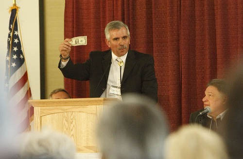 Leah Hogsten  |  The Salt Lake Tribune
Utah's Freedom Conference speaker Tom Selgas, CEO of the Bill of Rights Foundation  wants to promote silver and gold as legal tender. Conference goers paid their conference fees with a silver dollar, waiving the $45 conference registration fee, September 15, 2012,