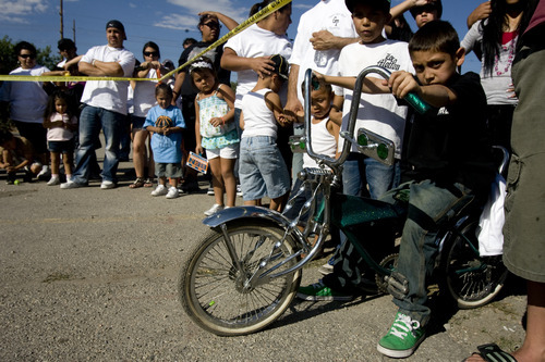 Kim Raff | The Salt Lake Tribune
Felix Gallegos sits on a customized BMX bike at El Grito de la Independencia celebration, Mexico's official independence day,  at Centro Civico Mexicano low rider car show in Salt Lake City, Utah on September 16, 2012.