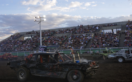 Kim Raff |  The Salt Lake Tribune
Zack Carter competes in the Demolition Derby on the last day of the Utah State Fair in Salt Lake City on Sept. 16, 2012.