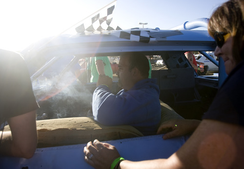 Kim Raff |  The Salt Lake Tribune
Teams prepare to compete in the Demolition Derby on the last day of the Utah State Fair in Salt Lake City on Sept. 16, 2012.