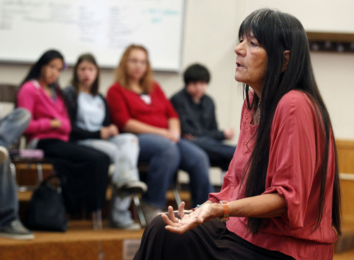 Al Hartmann  |  The Salt Lake Tribune
Native American storyteller Dovie Thomason tells stories to Granger High students as part of a month-long Native American ancient art immersion project.