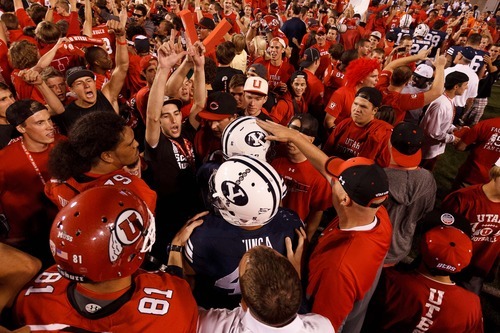 Trent Nelson  |  The Salt Lake Tribune
Utah fans swarm the field as Utah defeats BYU college football in Salt Lake City, Utah, Saturday, September 15, 2012.