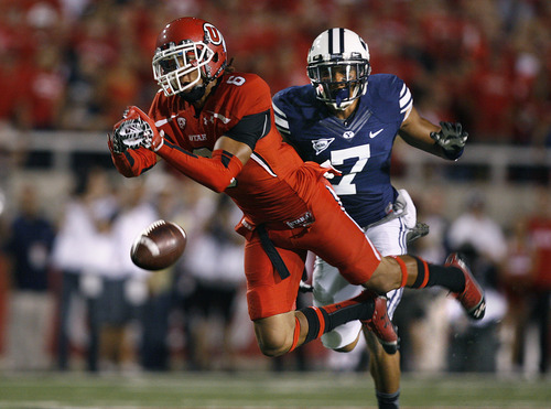 Scott Sommerdorf  |  The Salt Lake Tribune             
Utes wide receiver Dres Anderson missed controlling this long pass from QB Jon Hays during first-half play against BYU on Saturday, Sept. 15, 2012. Defending for BYU is DB Preston Hadley (7).