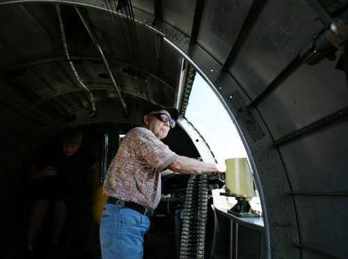 Steve Griffin | The Salt Lake Tribune


Robert McBride rests on a machine gun as he looks out the window ot the WWII B-17G bomber, 