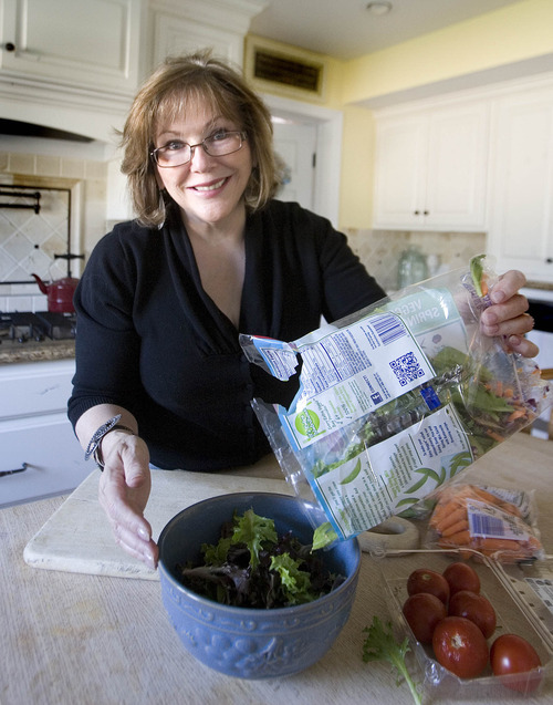 Paul Fraughton | Salt Lake Tribune

Jody Stubler, who had gastric bypass surgery three years ago, makes a salad in her kitchen. Since her surgery, exercise and eating  right have become her new way of life.