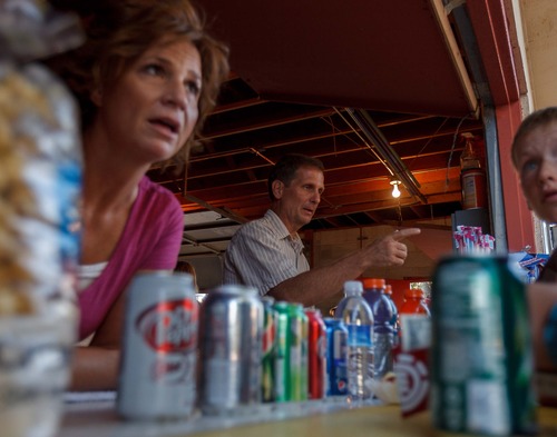 Trent Nelson  |  The Salt Lake Tribune
Republican Chris Stewart, who is running for the 2nd Congressional District, and his wife, Evie, volunteer in the concession booth at a Viewmont High School football game in Bountiful on a recent Friday night.
