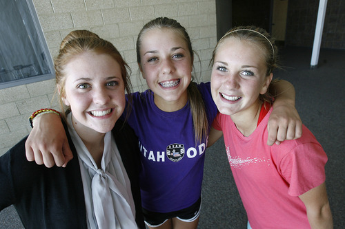 Scott Sommerdorf  |  The Salt Lake Tribune             
Ireland Dunn, center, a freshman on the Davis girls soccer team is having a terrific season as one of the leading scorers on the team. She is playing with her sister, Chelsea, right, who is a senior, and her other sister, Destiny, left, who is the team manager.