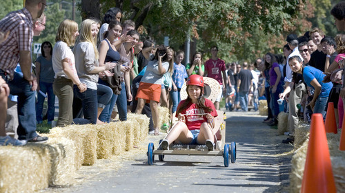 Paul Fraughton | The Salt Lake Tribune
Isabel Torres, a Rowland Hall sophomore, guides her team's gravity car down a hay bale lined course. The cars, built by the students earlier in the day were part of a science lesson dealing with potential and kinetic energy. The event was part  of the school's  